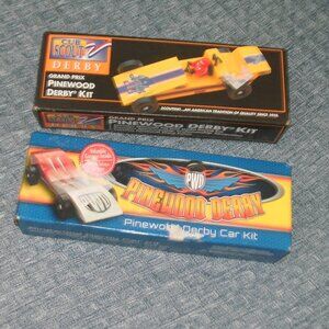 NIB set of TWO BSA Scouting Official Pinewood Derby Car kits date 1996 & 2012